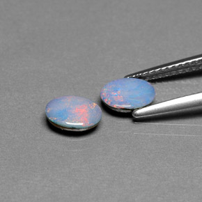 Doppietto di opale naturale multicolore da  ct, taglio ovale, opaco