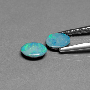Doppietto di opale naturale multicolore da  ct, taglio ovale, opaco