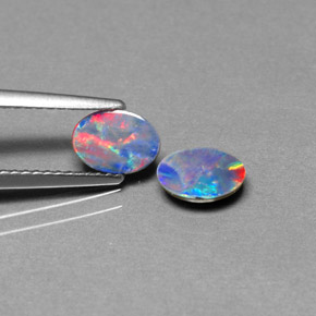 Doppietto di opale naturale multicolore da  ct, taglio ovale, opaco