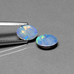 Doppietto di opale naturale multicolore da  ct, taglio ovale, opaco