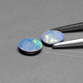 Doppietto di opale naturale multicolore da  ct, taglio ovale, opaco