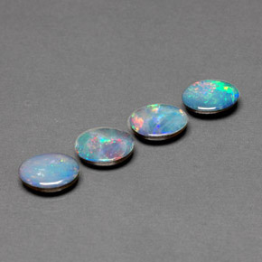 Doppietto di opale naturale multicolore da  ct, taglio ovale, opaco