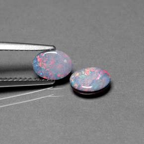 Doppietto di opale naturale multicolore da  ct, taglio ovale, opaco