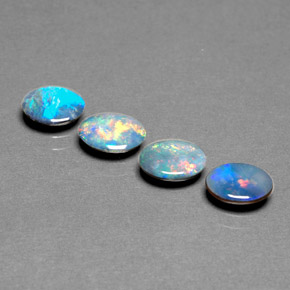 Doppietto di opale naturale multicolore da  ct, taglio ovale, opaco