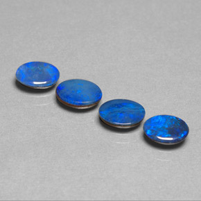 Doppietto di opale naturale blu da  ct, taglio ovale, opaco