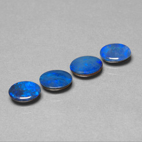 Doppietto di opale naturale blu da  ct, taglio ovale, opaco