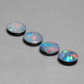 Doppietto di opale naturale multicolore da  ct, taglio ovale, opaco