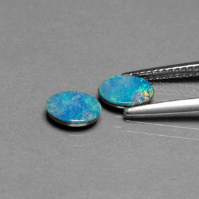 Doppietto di opale naturale multicolore da  ct, taglio ovale, opaco