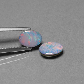 Doppietto di opale naturale multicolore da  ct, taglio ovale, opaco