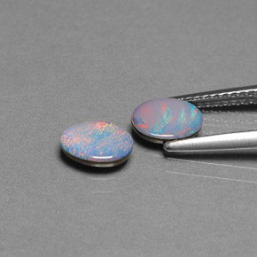 Doppietto di opale naturale multicolore da  ct, taglio ovale, opaco