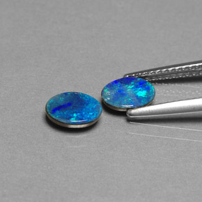 Doppietto di opale naturale multicolore da  ct, taglio ovale, opaco