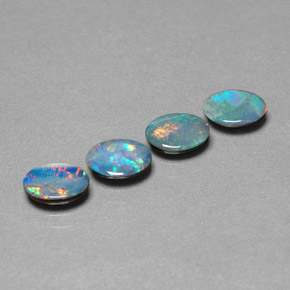 Doppietto di opale naturale multicolore da  ct, taglio ovale, opaco