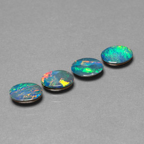 Doppietto di opale naturale multicolore da  ct, taglio ovale, opaco