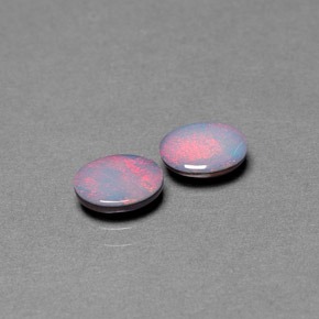 Doppietto di opale naturale multicolore da  ct, taglio ovale, opaco