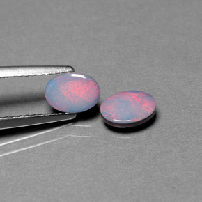 Doppietto di opale naturale multicolore da  ct, taglio ovale, opaco