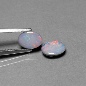 Doppietto di opale naturale multicolore da  ct, taglio ovale, opaco