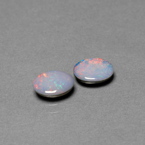 Doppietto di opale naturale multicolore da  ct, taglio ovale, opaco