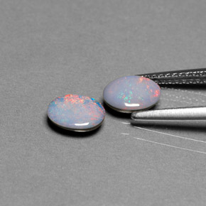 Doppietto di opale naturale multicolore da  ct, taglio ovale, opaco