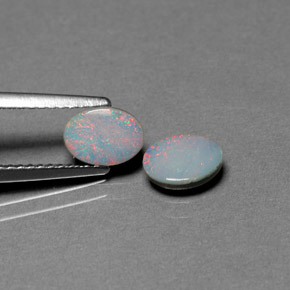 Doppietto di opale naturale multicolore da  ct, taglio ovale, opaco