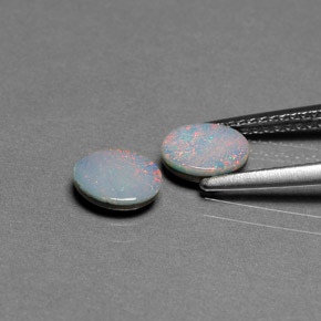 Doppietto di opale naturale multicolore da  ct, taglio ovale, opaco