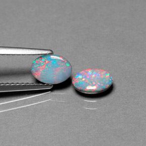 Doppietto di opale naturale multicolore da  ct, taglio ovale, opaco