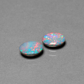 Doppietto di opale naturale multicolore da  ct, taglio ovale, opaco