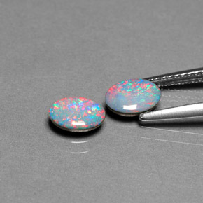Doppietto di opale naturale multicolore da  ct, taglio ovale, opaco