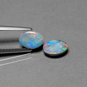 Doppietto di opale naturale multicolore da  ct, taglio ovale, opaco