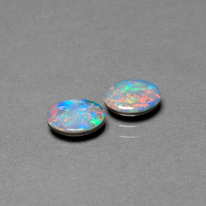 Doppietto di opale naturale multicolore da  ct, taglio ovale, opaco