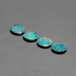 Doppietto di opale naturale multicolore da  ct, taglio ovale, opaco