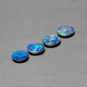 Doppietto di opale naturale multicolore da  ct, taglio ovale, opaco
