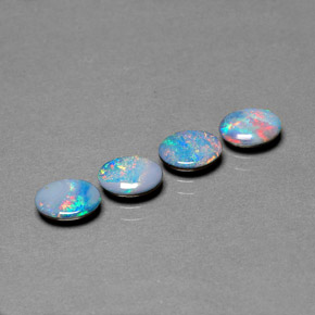 Doppietto di opale naturale multicolore da  ct, taglio ovale, opaco