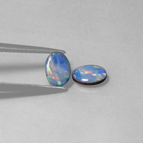 Doppietto di opale naturale multicolore da  ct, taglio ovale, opaco
