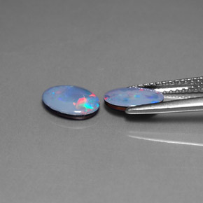 Doppietto di opale naturale multicolore da  ct, taglio ovale, opaco