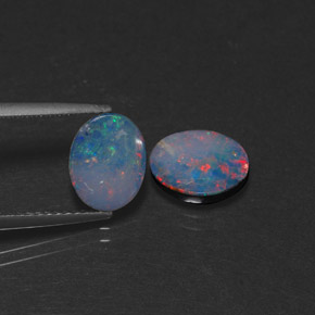 Doppietto di opale naturale multicolore da  ct, taglio ovale, opaco
