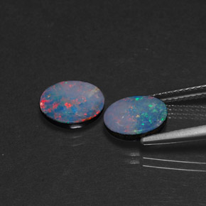 Doppietto di opale naturale multicolore da  ct, taglio ovale, opaco