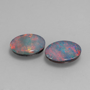 Doppietto di opale naturale multicolore da  ct, taglio ovale, opaco