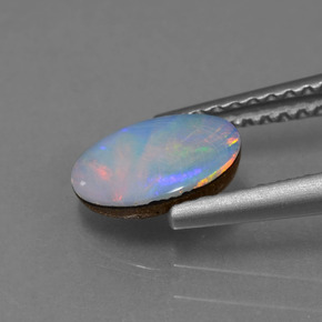 Opale doppietta Multicolore naturale da 0.69 ct, Ovale, Opaco
