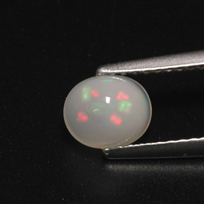 Opale naturale multicolore da 0,70 ct, taglio ovale, traslucido