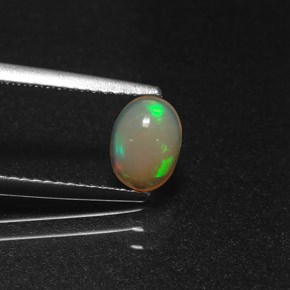 Opale naturale multicolore da 0,58 ct, taglio ovale, traslucido