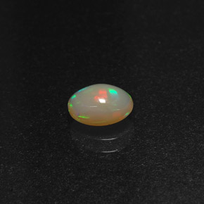 Opale naturale multicolore da 0,58 ct, taglio ovale, traslucido