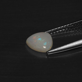 Opale naturale multicolore da 0,69 ct, trillion, traslucido