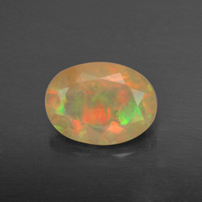 Opale naturale multicolore da 0,87 ct, taglio ovale, traslucido