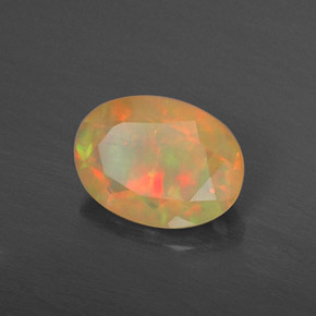 Opale naturale multicolore da 0,87 ct, taglio ovale, traslucido