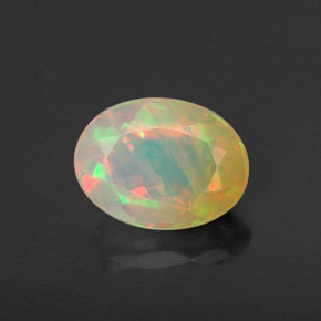Opale naturale multicolore da 0,87 ct, taglio ovale, traslucido