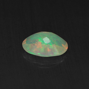 Opale naturale multicolore da 0,65 ct, trasparente, trasparente/traslucido