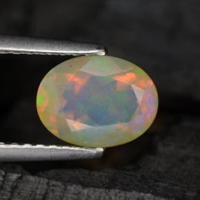 Opale naturale multicolore da 0,88 ct, taglio ovale, traslucido