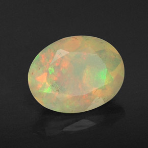 Opale naturale multicolore da 0,80 ct, taglio ovale, trasparente