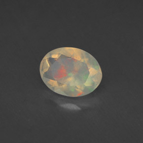 Opale naturale multicolore da 0,77 ct, taglio ovale, trasparente