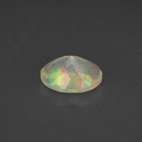 Opale naturale multicolore da 0,77 ct, taglio ovale, trasparente